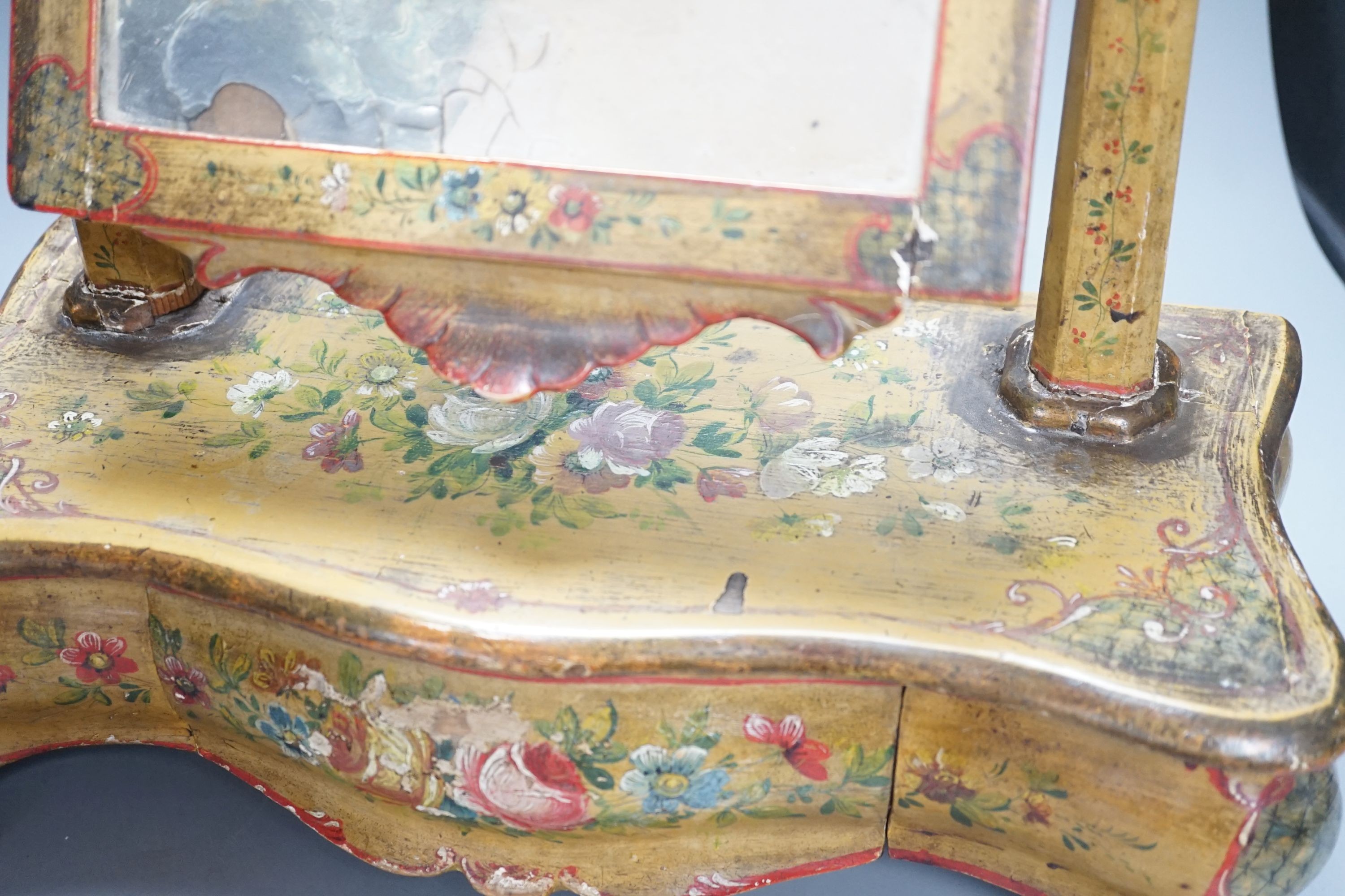 A yellow painted floral French toilet mirror - 55cm tall